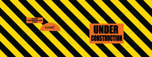 Under construction doc band wrap printed with caution yellow and black stripes, your child's name and the words under construction.